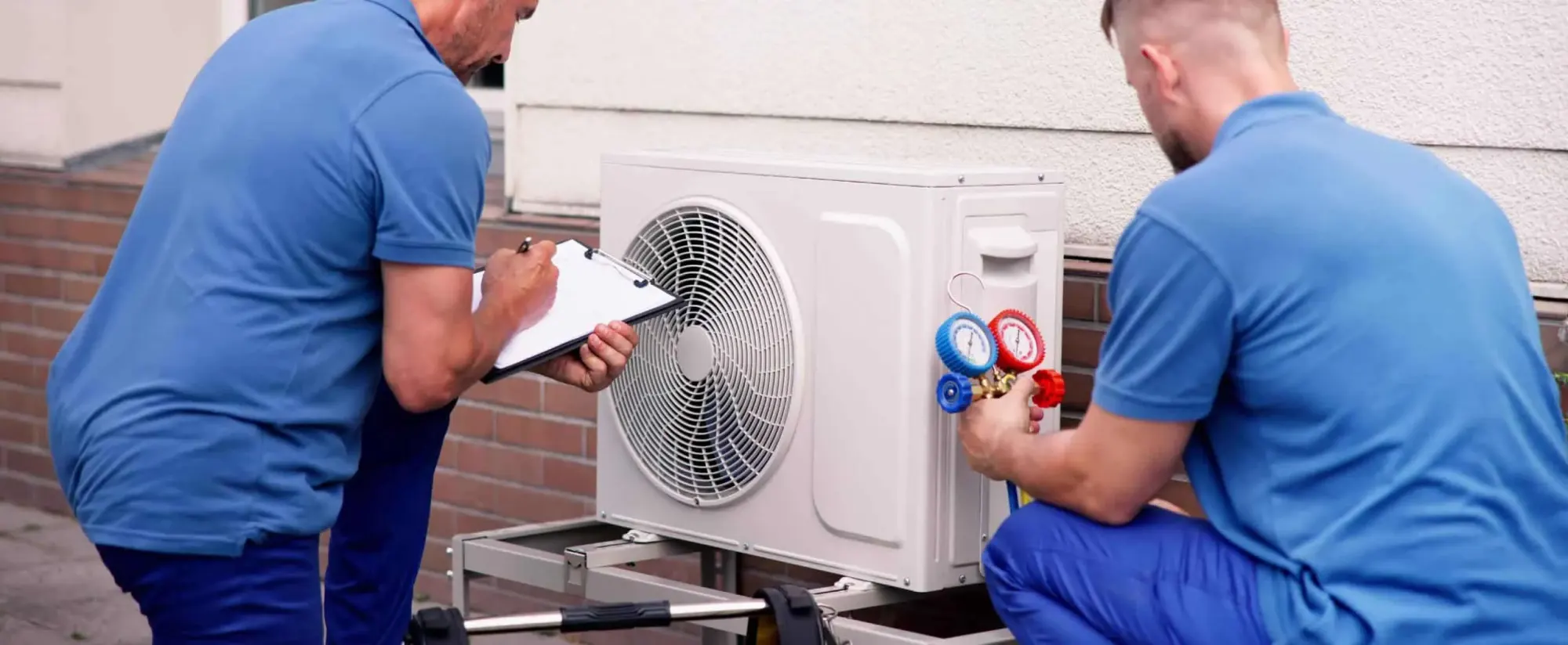 Technician servicing a residential heat pump in Rancho Cucamonga, CA